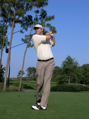 Golfer Swinging